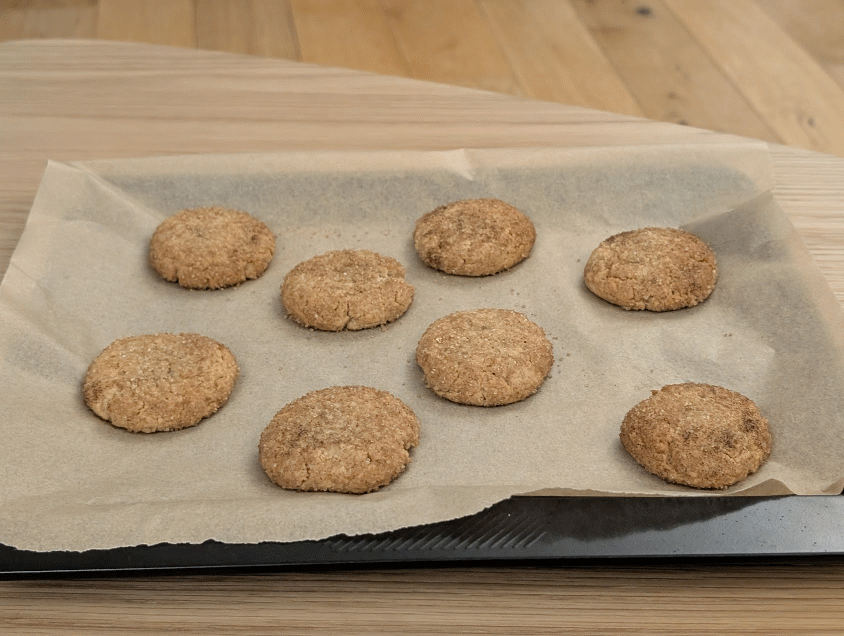 Cooked honey and cinnamon cookies on a baking tray